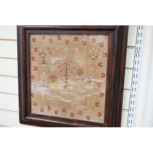 615A - A large framed sampler, 1817, 57 x 56cm including frame