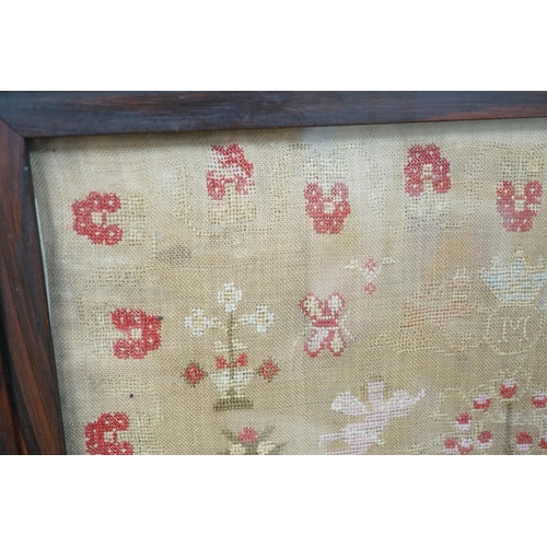 615A - A large framed sampler, 1817, 57 x 56cm including frame