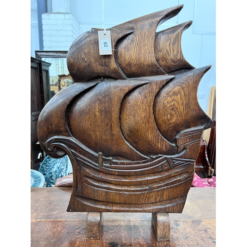 62 - An Art Deco style carved oak firescreen in the shape of a ship, width 57cm, height 74cm *Please note... 