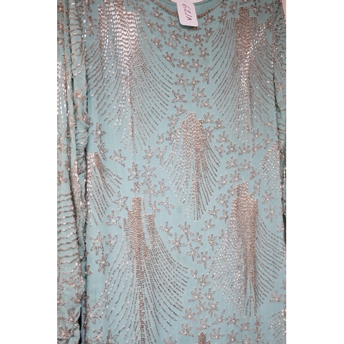 621A - A 1940's turquoise chiffon evening dress and peacock designed shawl owned by Princess Sevilla Hercol... 