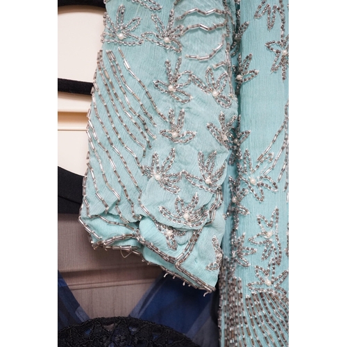 621A - A 1940's turquoise chiffon evening dress and peacock designed shawl owned by Princess Sevilla Hercol... 