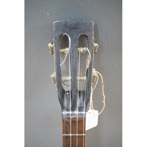 626A - A four string banjo style parlour guitar