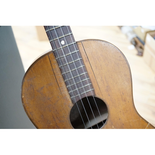 626A - A four string banjo style parlour guitar