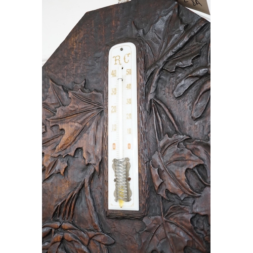 628A - A French carved wood aneroid barometer, 60 x 36cm