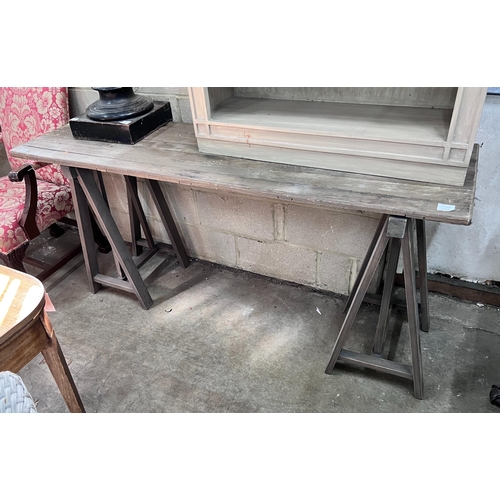 74 - A Victorian style trestle table with planked top, length 175cm, width 49cm, height 82cm *Please note... 