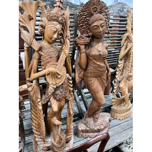 85 - Six Balinese carved hardwood figures, largest height 104cm *Please note the sale commences at 9am.... 