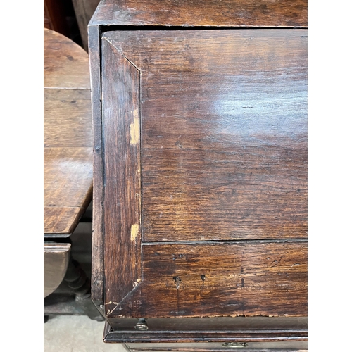 90 - An 18th century oak bureau, width 86cm, depth 50cm, height 102cm *Please note the sale commences at ... 