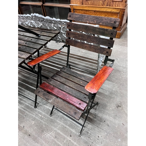 96 - A slatted wood and wrought iron rectangular folding garden table, length 122cm, depth 68cm, height 7... 