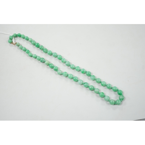 994 - A single strand jade bead necklace, 58cm, gross weight 91 grams.