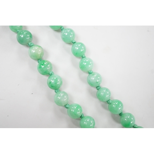 994 - A single strand jade bead necklace, 58cm, gross weight 91 grams.