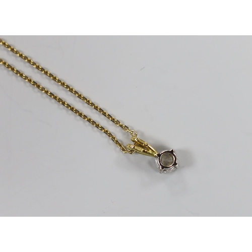 980 - A modern 18ct gold and solitaire diamond set pendant, 10mm, on an 18ct gold chain, 40cm, gross weigh... 