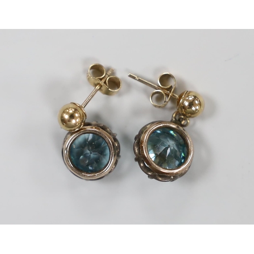 984 - A pair of 375  yellow metal and blue zircon set  earrings, 9mm, gross weight 4.4 grams.