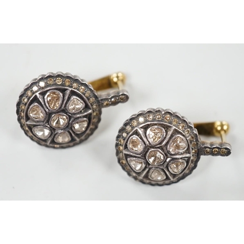 991 - A pair of Indian, yellow and white metal, rose and round cut diamond set target cluster earrings, di... 