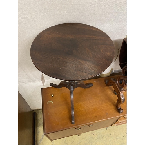 13 - A George III provincial circular oak tripod tea table, diameter 48cm, height 66cm