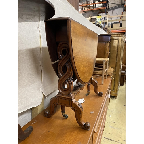 14 - A Victorian walnut Sutherland table, width 78cm, height 69cm