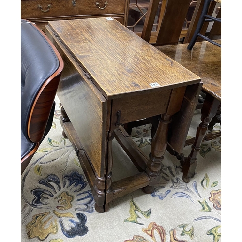 183 - A late 17th century William and Mary oak rectangular gateleg table, the four baluster turned support... 