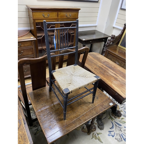 184 - A Victorian ebonised spindle back child's chair, with a rope seat