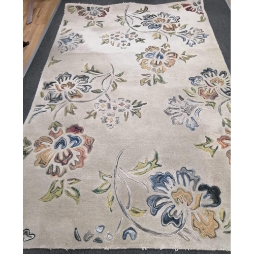 188 - A mid century Indian decorative cream ground carpet, 244 x 154cm
