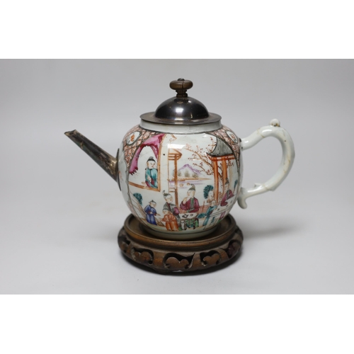 251 - An 18th century Chinese export famille rose teapot with later silver spout and cover, on hardwood st... 