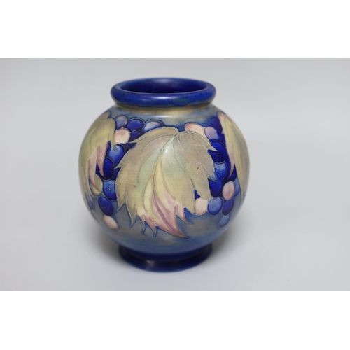 256 - A Moorcroft salt glaze 'Leaf and Berries' vase, 16cm
