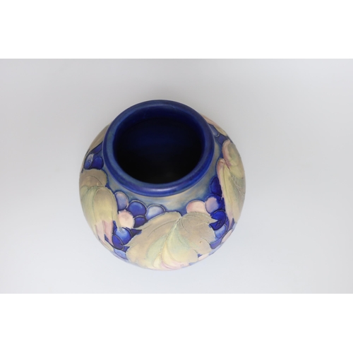 256 - A Moorcroft salt glaze 'Leaf and Berries' vase, 16cm