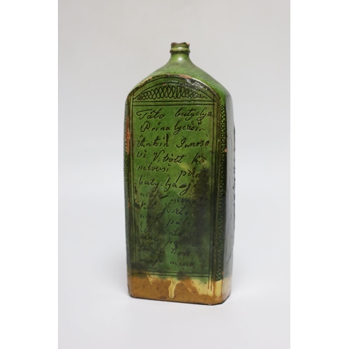 257 - A 19th century green glazed terracotta Sgraffito flask, 19cm