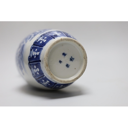 260 - A 19th century Chinese blue and white birds, rockwork and peonies vase, 26cm