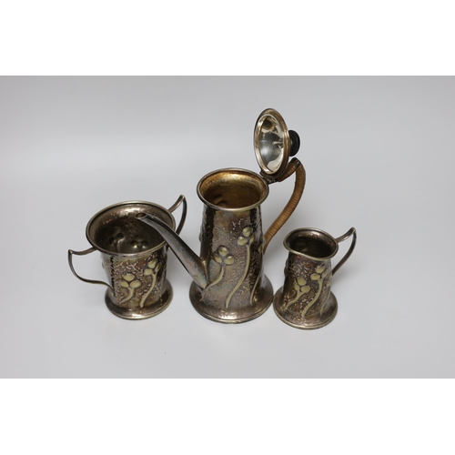 261 - A Mappin and Webb Art Nouveau plated three piece coffee set