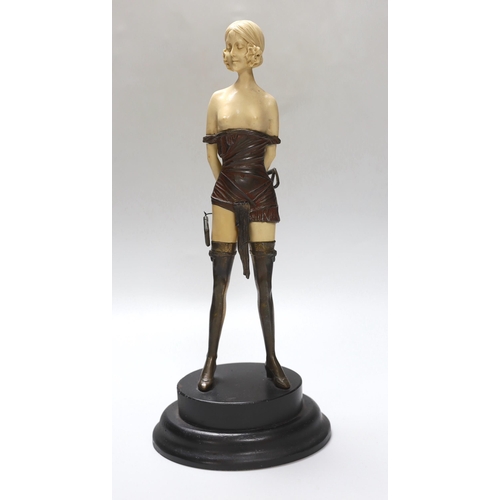 266 - An Art Deco style bronze and resin standing female figure, 32cm