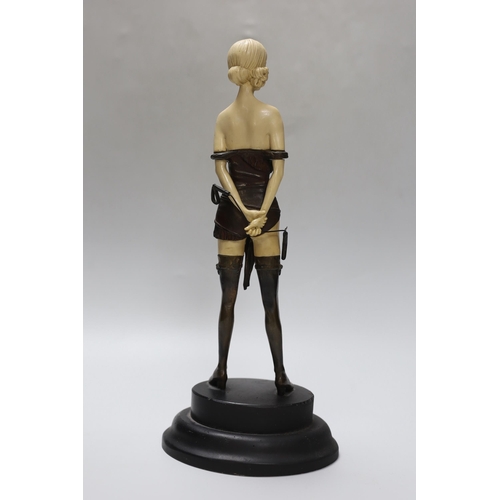266 - An Art Deco style bronze and resin standing female figure, 32cm