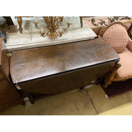 27 - An 18th century oak gateleg table, width 148cm, depth 55cm, height 73cm