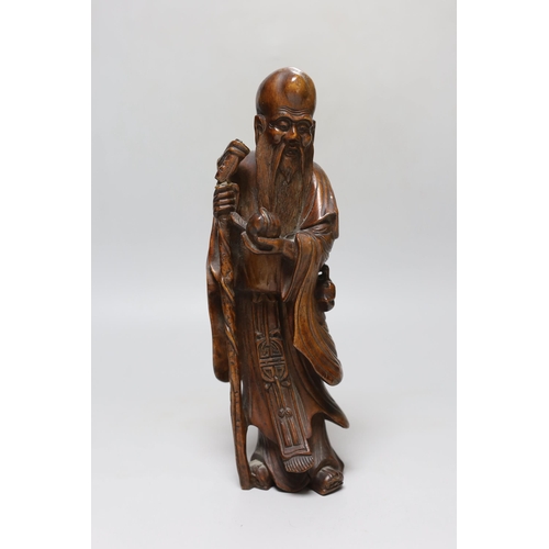 270 - A Chinese hardwood figure of Shou Lao, early 20th century, 29cm