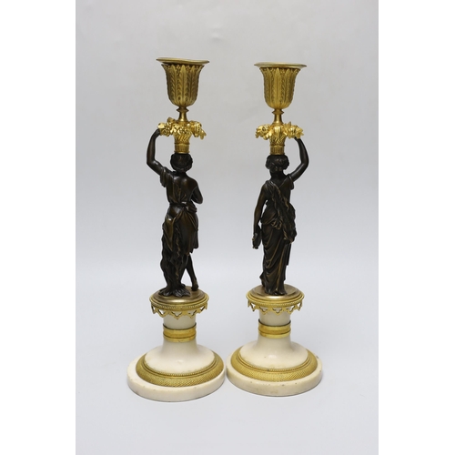 275 - A pair of early 20th century bronze, ormolu and alabaster figural candlesticks, 33cm