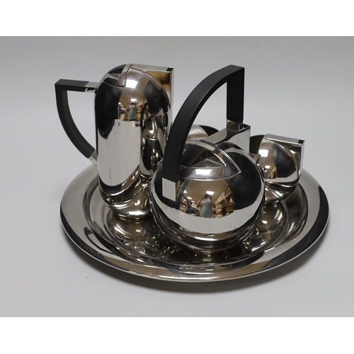 276 - An Oliver Hemming Nio stainless steel tea set
