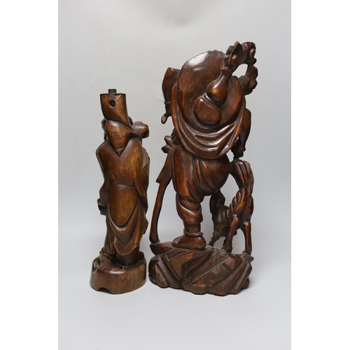 278 - An early 20th century Chinese hardwood figure of Liu Hai, and a similar figure of Shou Lao (2), tall... 