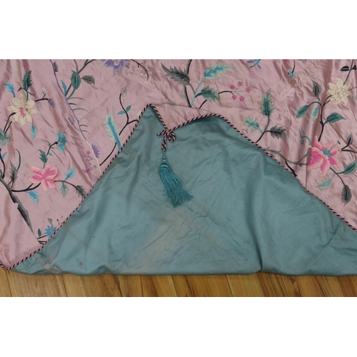 281 - An Oriental mauve ground embroidered silk shawl