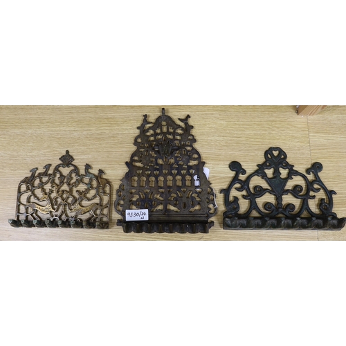 282 - Three Continental brass or bronze Hanukkah lamp, tallest 30cm