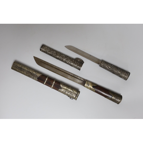 284 - Two Chinese knives and a terracotta lidded pot