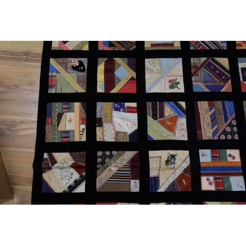 288 - A 19th century crazy patchwork quilt worked with silks and velvets in novelty motifs
