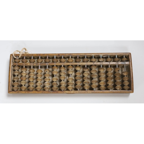 291 - A Chinese abacus, 34cm long