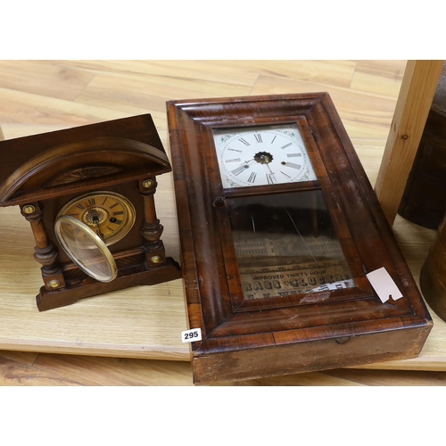 295 - An oak cased mantel clock and an American wall clock