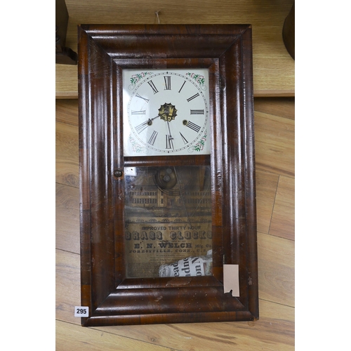 295 - An oak cased mantel clock and an American wall clock