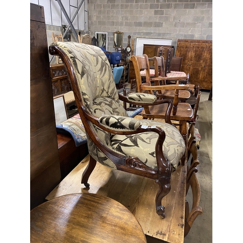 32 - A Victorian rosewood upholstered open armchair, width 65cm, depth 72cm, height 95cm