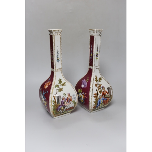 352 - A pair of early 20th century Dresden square  bottle vases, 31cm