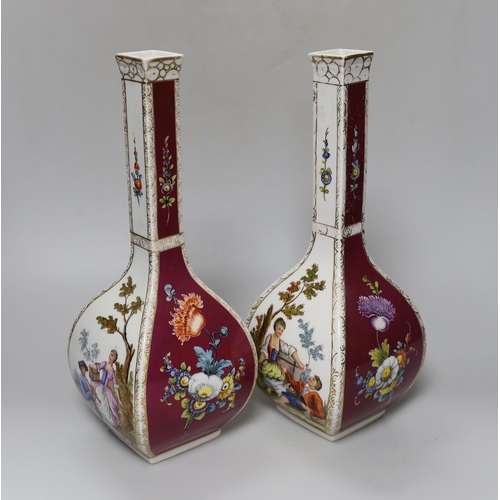 352 - A pair of early 20th century Dresden square  bottle vases, 31cm