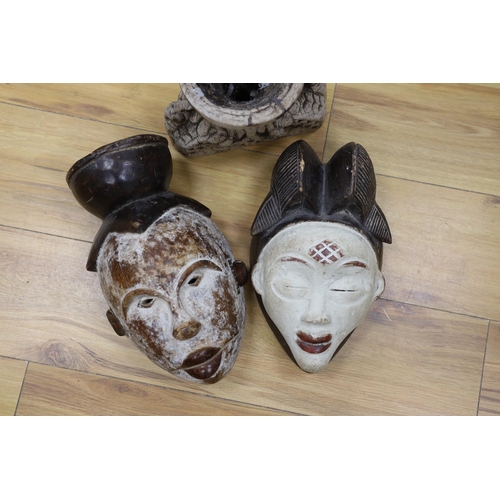 354 - The Two African masks and another carving, tallest mask 30cm high