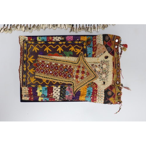 355 - 19th and 20th century textiles: An Indian mirrored and patchwork bag, a smaller embroidered bag, an ... 