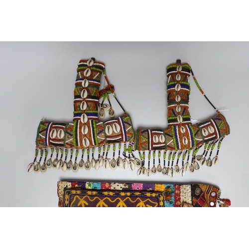 355 - 19th and 20th century textiles: An Indian mirrored and patchwork bag, a smaller embroidered bag, an ... 