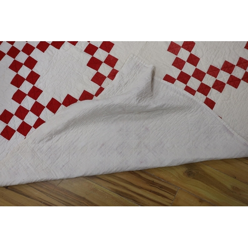 364 - An American quilt Texas Star pattern, red on white backing