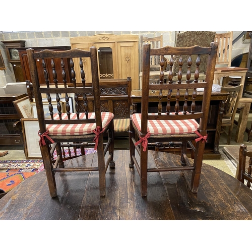 37 - A set of eight Lancashire rush seat spindle back dining chairs, plus one other